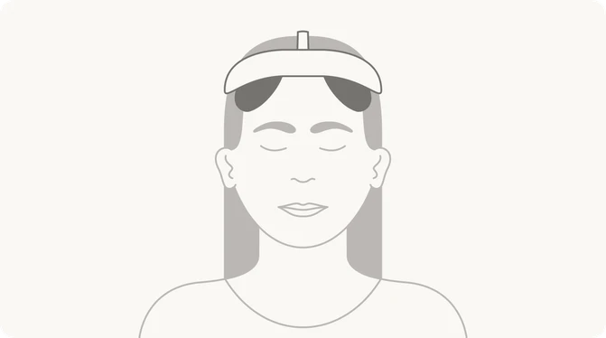 Person wearing Flow headset at home