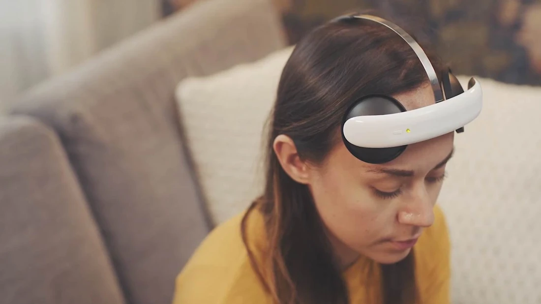 woman using Flow headset