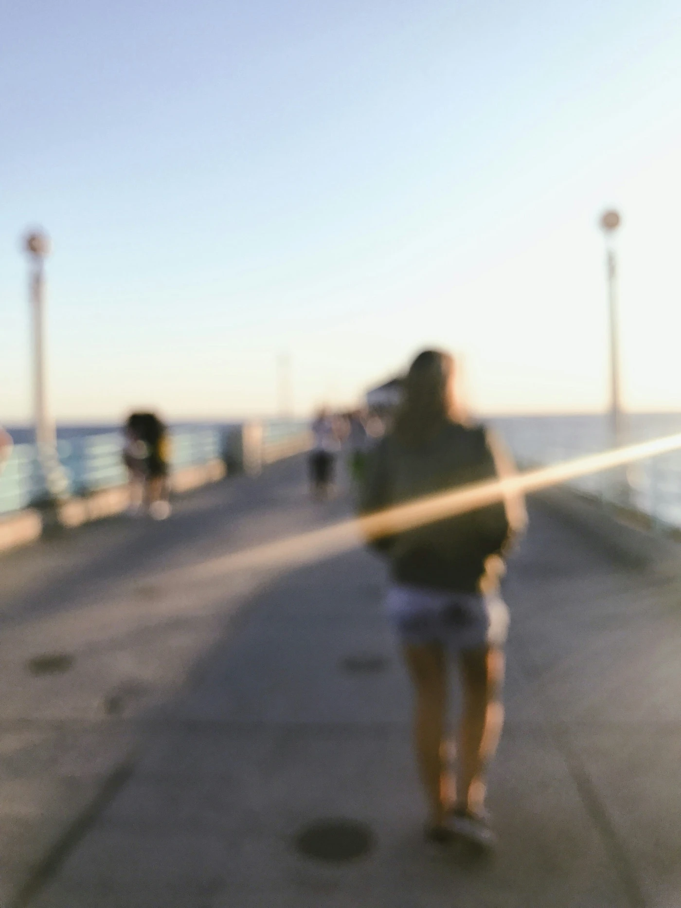 Person walking down a promenade